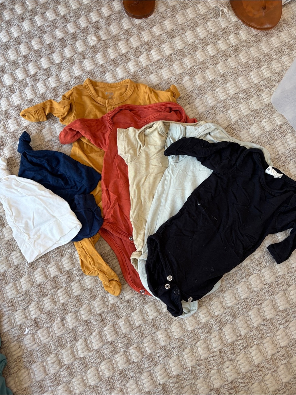 Kyte BABY One-Piece Set in Mustard, Rust, Cream, Navy, White, and Black